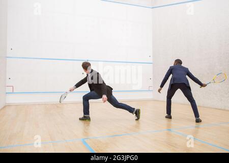 Les joueurs d'affaires Squash Banque D'Images