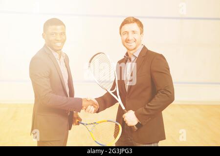 Les joueurs d'affaires Squash Banque D'Images