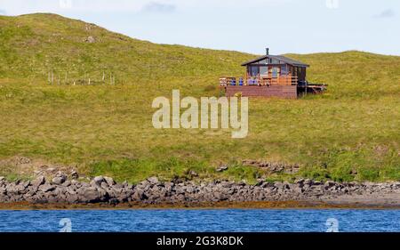 Maison individuelle sur une petite île - Islande Banque D'Images