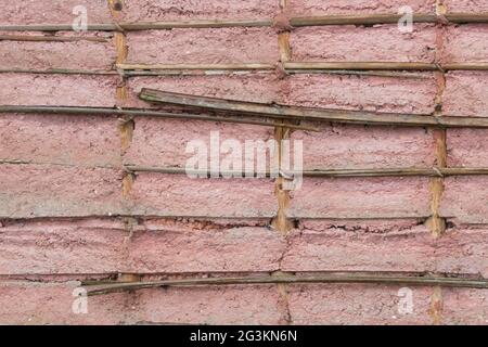 Texture de bambou dans le mur de béton coulé Banque D'Images