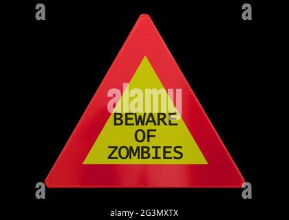 Panneau de signalisation isolé - attention aux zombies Banque D'Images