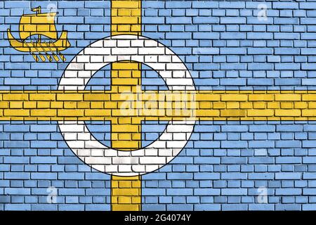 Drapeau de l'île de Skye peint sur un mur de briques Banque D'Images