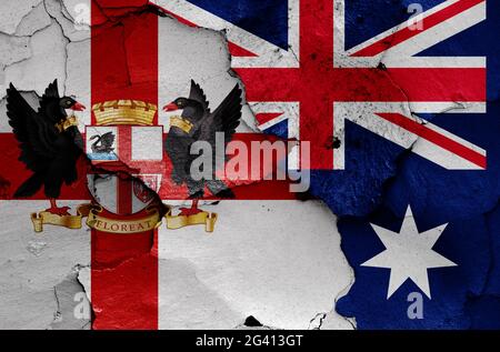 Drapeaux de Perth et d'Australie peints sur un mur fissuré Banque D'Images