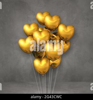 Ballons en forme de coeur doré sur fond de mur gris Banque D'Images