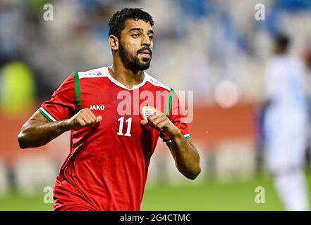 Doha, Qatar. 20 juin 2021. Muhsen Saleh Al Ghassani, d'Oman, célèbre son but lors du match de qualification de la coupe arabe de la FIFA au Qatar en 2021 entre Oman et la Somalie, à Doha, au Qatar, le 20 juin 2021. Credit: Nikku/Xinhua/Alay Live News Banque D'Images
