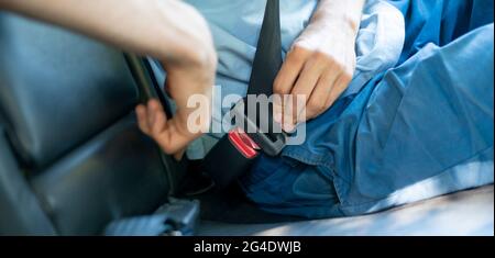 life saving seat belts, always fasten seat belts in car, security protection for driver and passenger Stock Photo