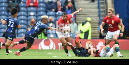 BT Murrayfield .Edinburgh.Scotland Royaume-Uni. 26 juin-21 Lions britanniques et irlandais contre le Japon en photo au cours du match Lions britanniques et irlandais Anthony Watson a été attaqué par Kotaro Matsushima Japon crédit : eric mccowat/Alay Live News Banque D'Images