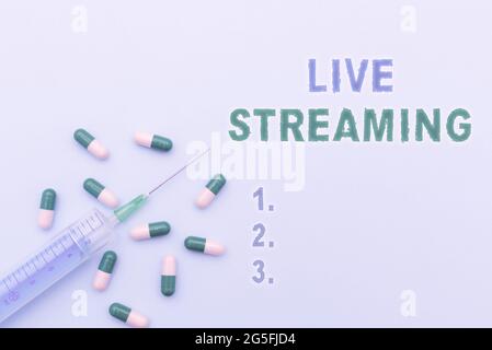 Affichage conceptuel Live Streaming. Mot pour afficher du contenu audio ou multimédia par des dispositifs numériques médicaments prescrits vitamines et minéraux pilules Banque D'Images