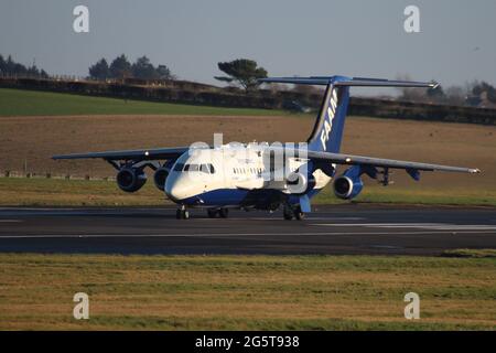 G-LUXE, une BAe 146 exploitée par le FFAAM (Facility for Airborne Atmospheric Measurements), à l'aéroport international de Prestwick à Ayrshire, en Écosse. Banque D'Images