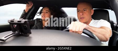 Fast & Furious 9 (2020) réalisé par Justin Lin et avec Michelle Rodriguez comme Letty et vin Diesel comme Dominic Toretto. Cyber-terroriste Cipher Cipher encadre l'aide de Jakob, le frère cadet de Dom pour prendre la revanche sur Dom et son équipe. Banque D'Images