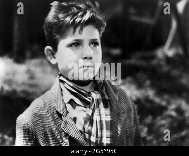 'Enzo Staiola, sur le tournage du film italien, ''Bicycle Thieves'' titre italien : ''Ladri Di Biciclette'', ''Ente Nazionale Industrie Cinematografiche'', 1948' Banque D'Images