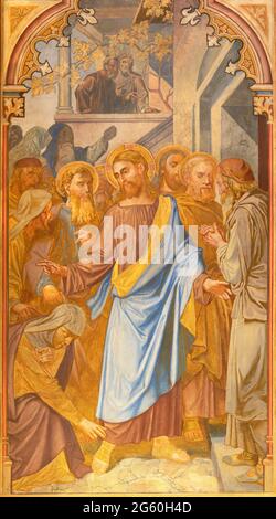 VIENNE, AUSTIRA - JUNI 24, 2021: La fresque du Christ et de la femme avec la question du sang dans l'église Votivkirche par les frères Carl et Franz Jobst Banque D'Images