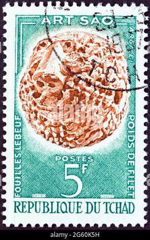 TCHAD - VERS 1963: Un timbre imprimé au Tchad à partir de l'édition 'so Art' montre le poids de fil sculpté, vers 1963. Banque D'Images