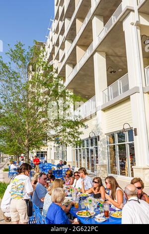 Alabama Orange Beach The Wharf, centre commercial, restaurant, terrasse, tables extérieures, personnes qui mangent des familles, Banque D'Images