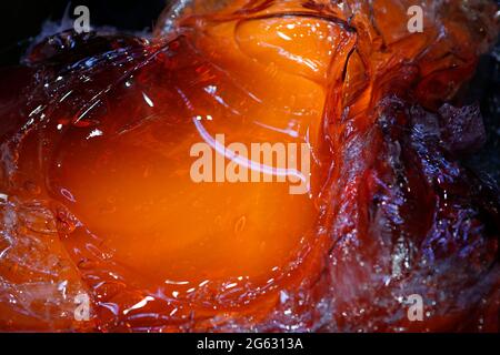 Détail, verre fondu rouge-chaud Banque D'Images