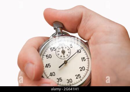 Le bouton du chronomètre appuie sur le doigt de la main sur fond blanc, isole. Banque D'Images