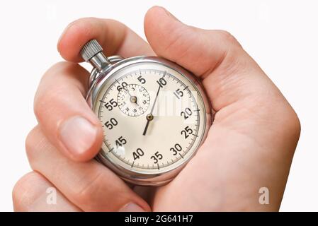 Le bouton du chronomètre appuie sur le doigt de la main sur fond blanc, isole. Banque D'Images