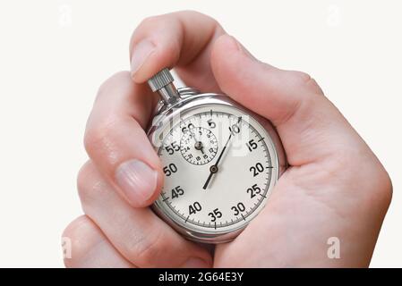 Le bouton du chronomètre appuie sur le doigt de la main sur fond blanc, isole. Banque D'Images