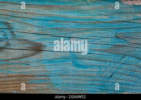Un cliché de texture d'une planche en bois marquée de craie bleue. Banque D'Images