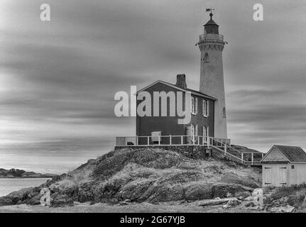 Phare Fisgard noir et blanc HDR Victoria C.-B. Banque D'Images