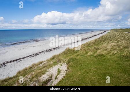 La plage de Howmore (Tobha Mor) se trouve à l'ouest du Loch Druidibeg et vous pourrez admirer de charmants cottages en chaume et d'anciennes chapelles pendant que vous vous promenez le long de l' Banque D'Images