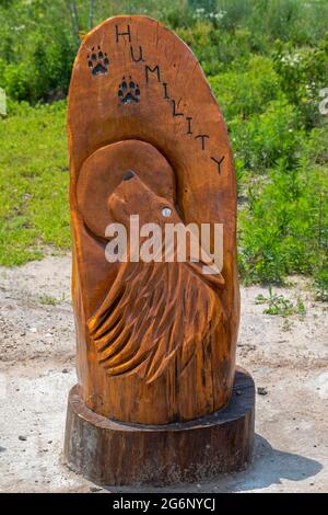 Port Huron, Michigan - l'un des sept enseignements grand-père, les valeurs amérindiennes représentées dans les sculptures en bois le long de la promenade de Blue Water River. TH Banque D'Images