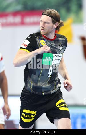 Nuremberg, Allemagne. 11 juillet 2021. Handball: Match international, Allemagne - Egypte dans l'arène Nrnberger Versicherung. Tobias Reichmann, d'Allemagne, célèbre son but. Credit: Daniel Karmann/dpa/Alay Live News Banque D'Images