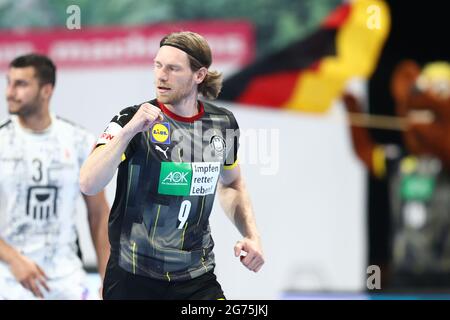 Nuremberg, Allemagne. 11 juillet 2021. Handball: Match international, Allemagne - Egypte dans l'arène Nrnberger Versicherung. Tobias Reichmann, d'Allemagne, célèbre son but. Credit: Daniel Karmann/dpa/Alay Live News Banque D'Images