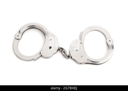Menottes métalliques isolées sur fond blanc Banque D'Images