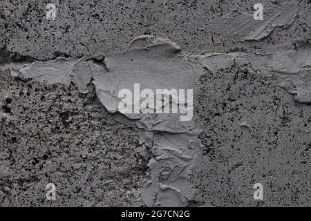 Fond calcaire gris foncé utilisé pour le plan de travail de la cuisine, la table, le seuil de la fenêtre, la clôture. Noir et blanc igneux brique pierre texture.texte signe publicité Banque D'Images