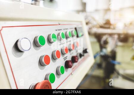 Plusieurs boutons de la machine en usine Banque D'Images