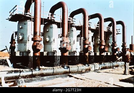 15 juin 1975, Union soviétique, Talnoje: À la station de compression de Talnoje. La ligne Druzhba était un projet de jeunesse central de la Jeunesse allemande libre (FDJ) dans les années 1970. La section de construction de la RDA a fait 550 kilomètres de long, sur un total de 2,750 kilomètres. Date exacte de la photo inconnue. La photo a été numérisée à partir de la diapositive d'origine. Photo: Sammlung Heinz/dpa-Zentralbild/ZB Banque D'Images