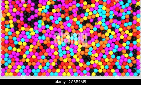 graphiques 3d. Balles multicolores en plastique au hasard. Beaucoup de petites boules colorées. Boules, sphères, bulles. Gros plan Banque D'Images