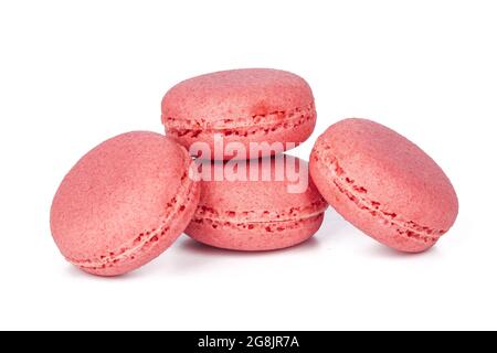 Quatre délicieux macarons macarons roses ou isolé sur fond blanc Banque D'Images