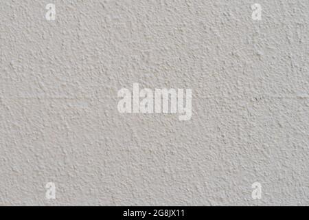 Mur en plâtre rugueux peint, couleur gris clair, surface rayée, arrière-plan, espace de copie Banque D'Images