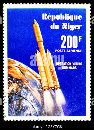 RÉPUBLIQUE DU NIGER - VERS 1977 : timbre-poste du Niger montrant le départ de la fusée Titan pour Mars Banque D'Images