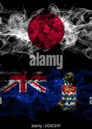 Drapeaux de fumée du Japon, du Japon et de la Grande-Bretagne, des îles Caïman Banque D'Images