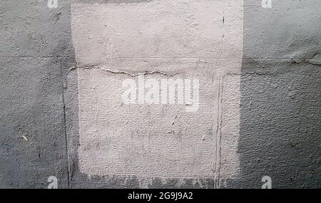 Mur en béton gris. Gros gros coups de peinture sur la surface de la maison. Gros plan. Arrière-plan classique. Copier l'espace. Placer pour le texte Banque D'Images