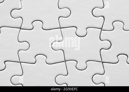 Fond de puzzle blanc vide ou vierge. Vue macro en gros plan. Banque D'Images