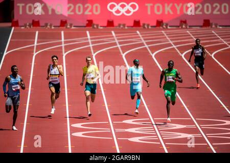 Le Botswana Isaac Makwala, le belge Jonathan Sacoor et le jeune Kirani James de la Grenade photographiés en action pendant les épreuves de la course de 400 m des hommes à l'athlétisme Banque D'Images