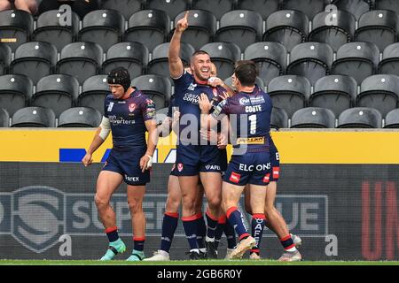 Joel Thompson (11), de St Helens, célèbre l'essai d'ouverture Banque D'Images