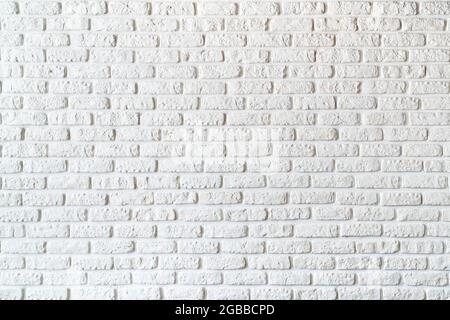 Briques peintes en blanc sur la décoration murale pour l'arrière-plan. Photo de haute qualité Banque D'Images