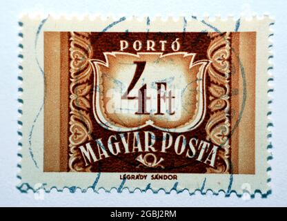 Un timbre-poste imprimé en Hongrie montre la valeur 4 ft four Forint et texte Magyar Posta vers 1969, isolé sur fond blanc, rétro antique Banque D'Images