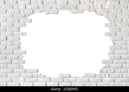 Mur de briques peintes en blanc cassé, endommagé du centre. Décoration pour l'arrière-plan. Photo de haute qualité Banque D'Images