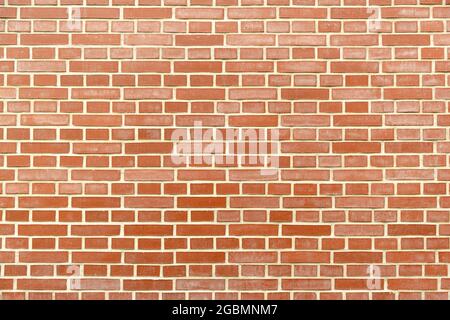 Arrière-plan mural en brique rouge sans couture Banque D'Images
