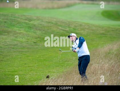 En Écosse, Calum Hill joue son deuxième tir de l'rugueux le 9 au cours de la première journée de l'Open de héros au parcours de golf Fairmont St Andrews, à St Andrews. Date de la photo : jeudi 5 août 2021. Banque D'Images