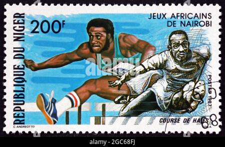 NIGER - VERS 1977: Un timbre imprimé au Niger montre haies, Jeux africains, Nairobi, vers 1977 Banque D'Images