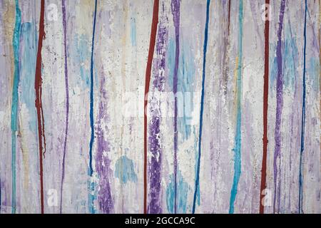 Arrière-plan de peinture abstrait. Lignes colorées et éclaboussures de peinture acrylique sur une surface murale blanche. Photo de haute qualité Banque D'Images