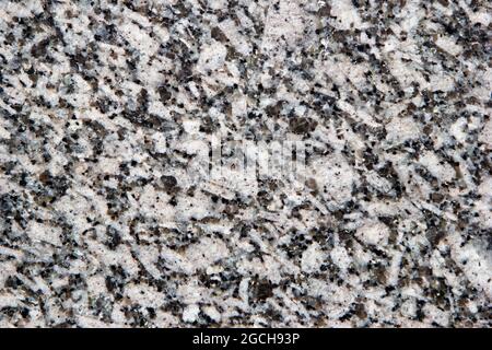 Gros plan sur la texture en granit. Granit noir et blanc naturel. Vue de dessus Banque D'Images