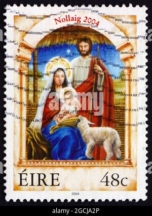 IRLANDE - VERS 2004: Un timbre imprimé en Irlande montre Sainte famille, Noël, vers 2004 Banque D'Images